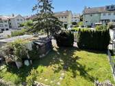Gartenansicht - Reiheneckhaus für die kleine Familie mit Garten und Garage