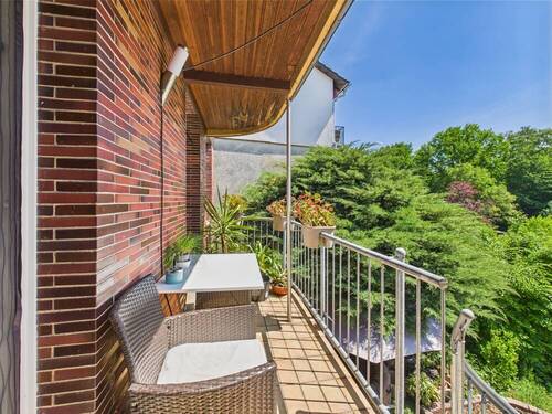 Sonnenbalkon mit Blick in den Garten EG - Mehrfamilienhaus, Wohnhaus mit 187,80 m&sup2; in Heusweiler / Dilsburg zum Kaufen