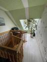 Treppe Wohng.1. OG Maisonette - 