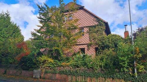 Bild 2 - 8 Zimmer Mehrfamilienhaus, Wohnhaus zum Kaufen in Heinade