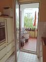 Küche mit Austritt zur Loggia - 