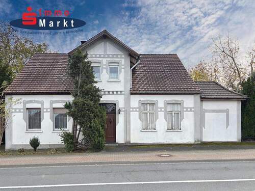 Straßenansicht - 8 Zimmer Einfamilienhaus zum Kaufen in Hille