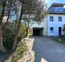 Haus mit großem Garten, Dachstudio, Carport und Vollkeller in Tornesch