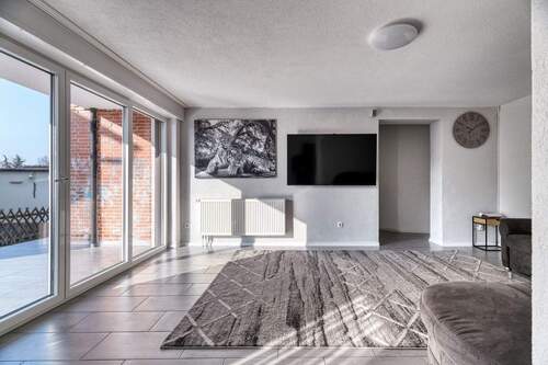 Wohnbereich EG mit Südterrasse - 8 Zimmer Einfamilienhaus in Lambsheim