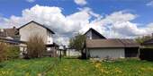 Haus von der Gartenseite - Charmantes Ein- bis Zweifamilienhaus mit großem Garten und Potenzial zur individuellen Gestaltung