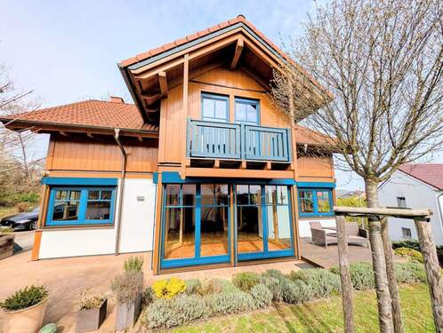 Hausansicht Wintergarten - Einfamilienhaus mit 180,00 m&sup2; in Bad Kreuznach zum Kaufen