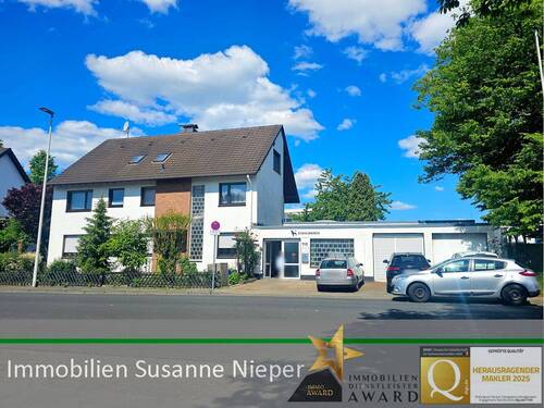 Hausansicht - Vielfältige Nutzungsmöglichkeiten. Beziehbares 2-Familienhaus mit vermieteten Betriebsgebäude in Solingen Aufderhöhe
