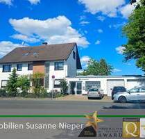 Vielfältige Nutzungsmöglichkeiten. Beziehbares 2-Familienhaus mit vermieteten Betriebsgebäude in Solingen Aufderhöhe
