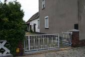 Zugang - Mehrfamilienhaus, Wohnhaus in Bad Liebenwerda