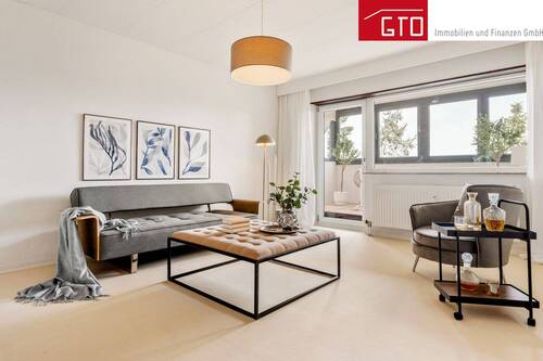 Wohnzimmer - Ruhe. Weitblick. Wohnqualität. 3,5-Zimmer-Wohnung direkt am See in Rodgau-Nieder-Roden