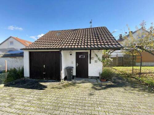 Garage mit Werkstatt/Abstellraum - Einfamilienhaus mit 169,00 m&sup2; in Neu-Ulm zum Kaufen