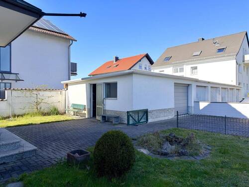 Garage mit 2 Stellplätzen - Einfamilienhaus mit 170,00 m&sup2; in Rodgau zum Kaufen
