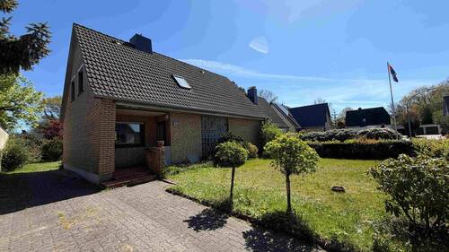 Ansicht - Familienfreundliches Zuhause mit großem Potenzial - Einfamilienhaus in ruhiger Lage von Heist