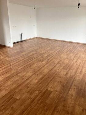 Bild 7 Wohnbereich mit offener Küche.jpg - 