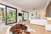Schlafzimmer mit Balkon zum Garten - 