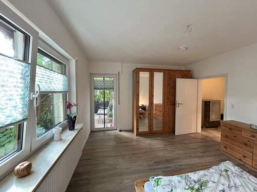 Schlafzimmer mit Zugang zur Terrasse - Terrassenwohnung mit 86,50 m² in Schramberg zum Kaufen