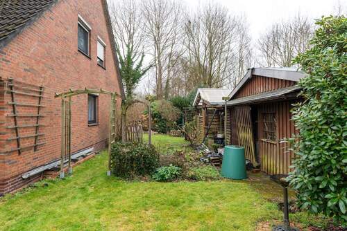 Seitenansicht - 8 Zimmer Mehrfamilienhaus, Wohnhaus in Lauenbrück