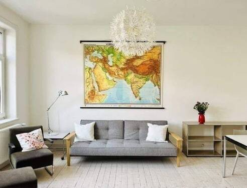 Wohnzimmer mit Schlafsofa - 3 Zimmer Etagenwohnung in Hannover