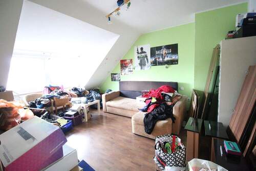 Wohnzimmer - Schöne, zentrale 2- Zimmerwohnung mit Einbauküche zu vermieten