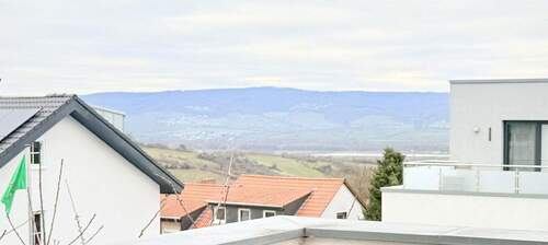 Bild 1 - Moderne 3-Zimmer-Wohnung mit Einbauküche und großer Terrasse mit Blick in den Rheingau