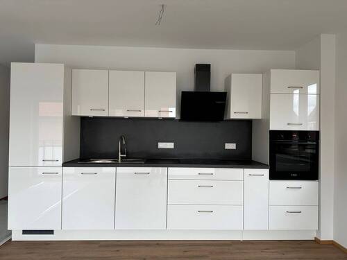Einbauküche - KfW-Effizienzhaus 40 - 4,5-Zimmer-Wohnung im Neubau: Ihr sonniges Zuhause in Seenähe