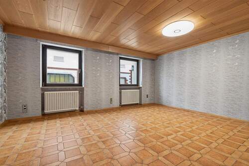 Wohnzimmer - Doppelhaushälfte mit 109,00 m&sup2; in Stutensee / Blankenloch zum Kaufen