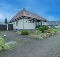 Winkelbungalow mit Ausbaureserve, Keller und Garage in ruhiger, familiengerechter Lage von Hohn