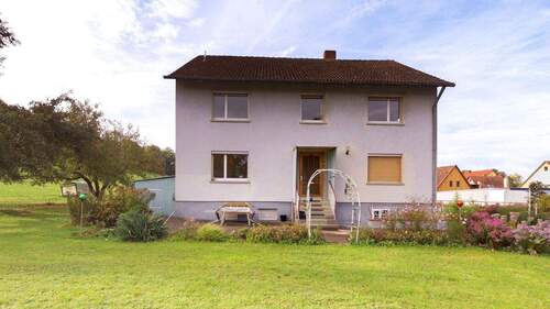Bild 3 - 8 Zimmer Mehrfamilienhaus, Wohnhaus in Gebsattel