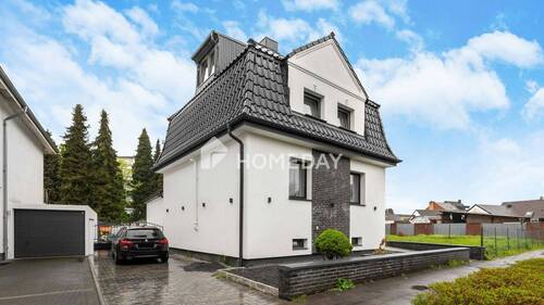 Außenansicht 1 - Komplett saniertes Einfamilienhaus mit moderner Ausstattung & traumhaftem, großzügigem Garten