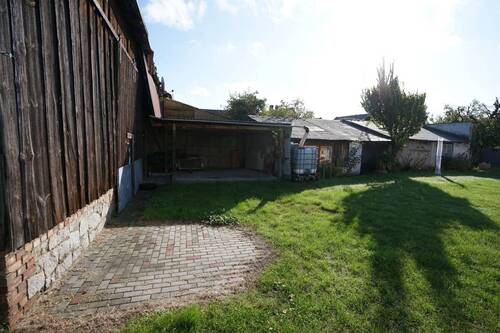 Carport und Nebengelasse - Einfamilienhaus mit 124,00 m² in Kuschkow zum Kaufen