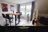 Essbereich mit Balkonzugang - 3 Zimmer Etagenwohnung in Harpstedt
