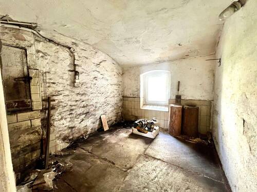 Zimmer Erdgeschoss Holzlager - 