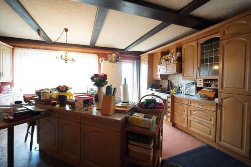 Wohnküche mit Ausgang zum Grundstück - 