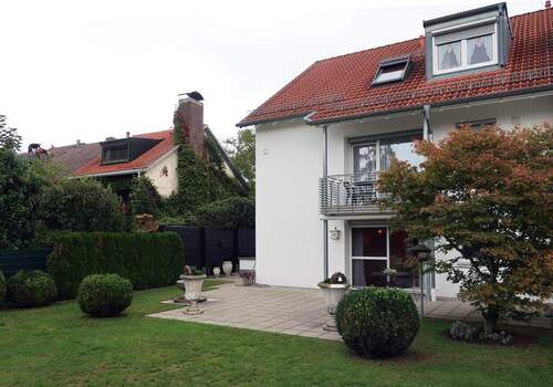 Gartenwohnung mit Terrasse - Attraktive 3-Zimmer-Gartenwohnung mit Terrasse und zwei Tiefgaragenstellplätzen in München-Pasing