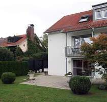 Attraktive 3-Zimmer-Gartenwohnung mit Terrasse und zwei Tiefgaragenstellplätzen in München-Pasing