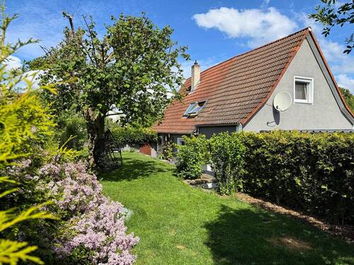 Garten 2 - Gemütliches und energieeffizientes Einfamilienhaus mit Garten, Einbauküche und Carport