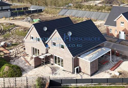 Ansicht - K 586 - Erstbezug in eine moderne und energieeffiziente Doppelhaushälfte mit Carport, Geräteraum und Terrasse in Beesten!!