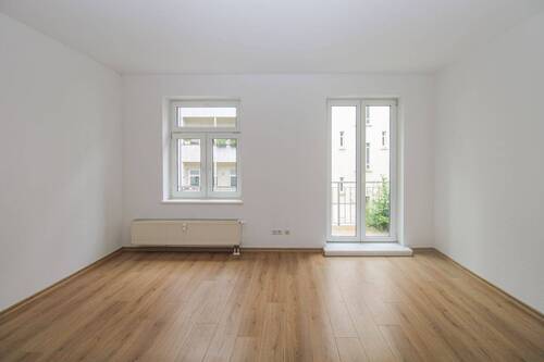 Wohnzimmer WE 12 - Charmantes Hinterhaus mit zwei Wohneinheiten in begehrter Lage in Gohlis