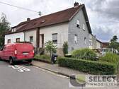 Ansicht - Aus Bankverwertung! Einfamilienhaus mit Garten und 2 Garagen in ruhiger Lage