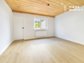 Wohnzimmer 1.OG (KI Staging) - Charmantes Reihenhaus mit Terrasse, Garage und viel Platz für die Familie