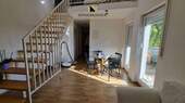 Blick zum Essplatz und Treppe zur Empore - 1 Zimmer Etagenwohnung zum Kaufen in Köngen