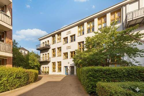 Fassade - Exklusive Designerwohnung mit Loftcharakter und Privatgarten in denkmalgeschützten Puccini-Hofgärten