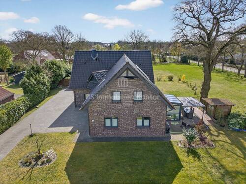 Bild 2 - 7 Zimmer Einfamilienhaus zum Kaufen in Westoverledingen / Flachsmeer
