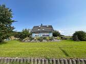 Ansicht mit Garten - Einfamilienhaus mit 127,00 m² in Wächtersbach zum Kaufen