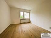 Blick in das Wohnzimmer - 2 Zimmer Etagenwohnung in München
