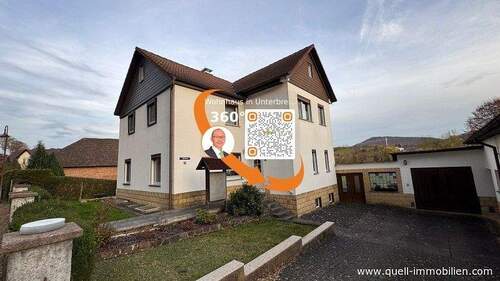 Titelbild - Gepflegtes EFH mit Garagen, Nebengebäude, Gartenhaus u. schönem Grst. in Unterbreizbach zu verkaufen