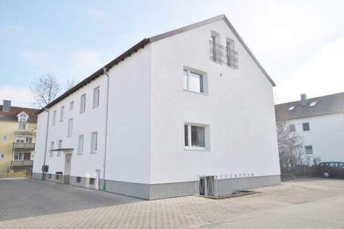 Hausansicht - Etagenwohnung mit 65,80 m&sup2; in Pocking zum Kaufen