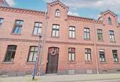 Hausansicht / Straßenseite - Interessantes Reihenmittelhaus mit Wohlfühlcharakter in Roßlau