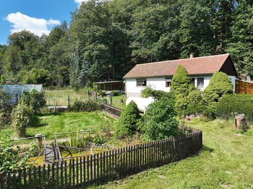 Blick auf den Bungalow - Einfamilienhaus mit 78,00 m² in Bad Gottleuba-Berggießhübel / Hellendorf zum Kaufen