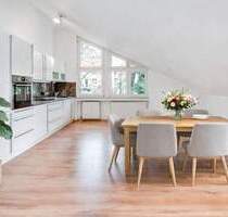 AIGNER - Moderne Dachgeschosswohnung mit Bergblick in Starnberg-Söcking